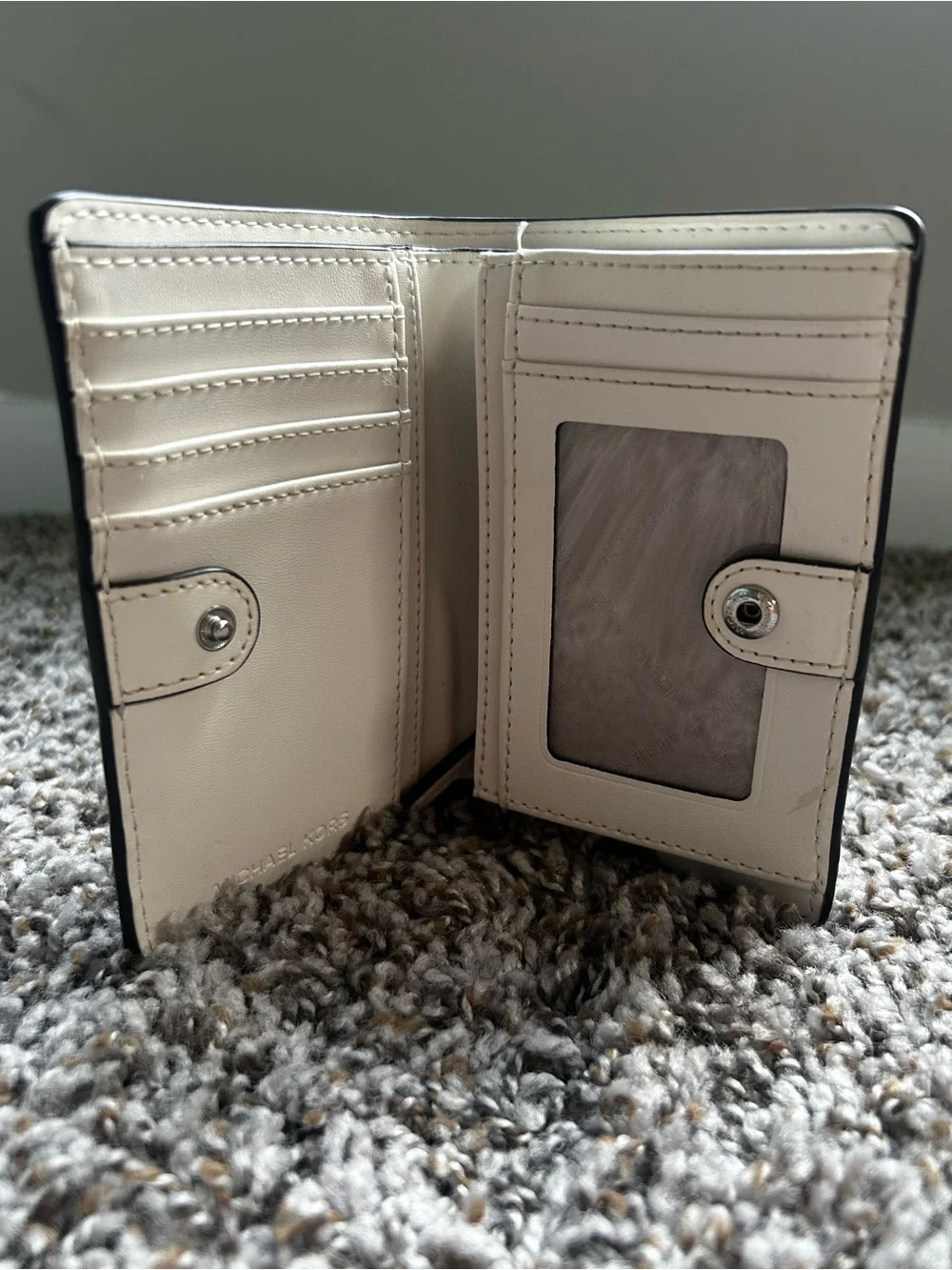 Michael Kors Pebbled Leather Fold-Over Wallet in Off-White with Silver Logo